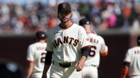 San Francisco Giants manager Tony Vitello (23) walks to the dugout after a pitching change during the eighth inning against the New York Yankees at Oracle Park.