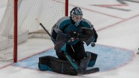 San Jose Sharks goaltender Alex Nedeljkovic (33) makes a save against the Winnipeg Jets during the third period at SAP Center at San Jose.