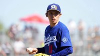 Los Angeles Dodgers starting pitcher Roki Sasaki (11) pitches against the Cleveland Guardians during the third inning at Goodyear Ballpark.