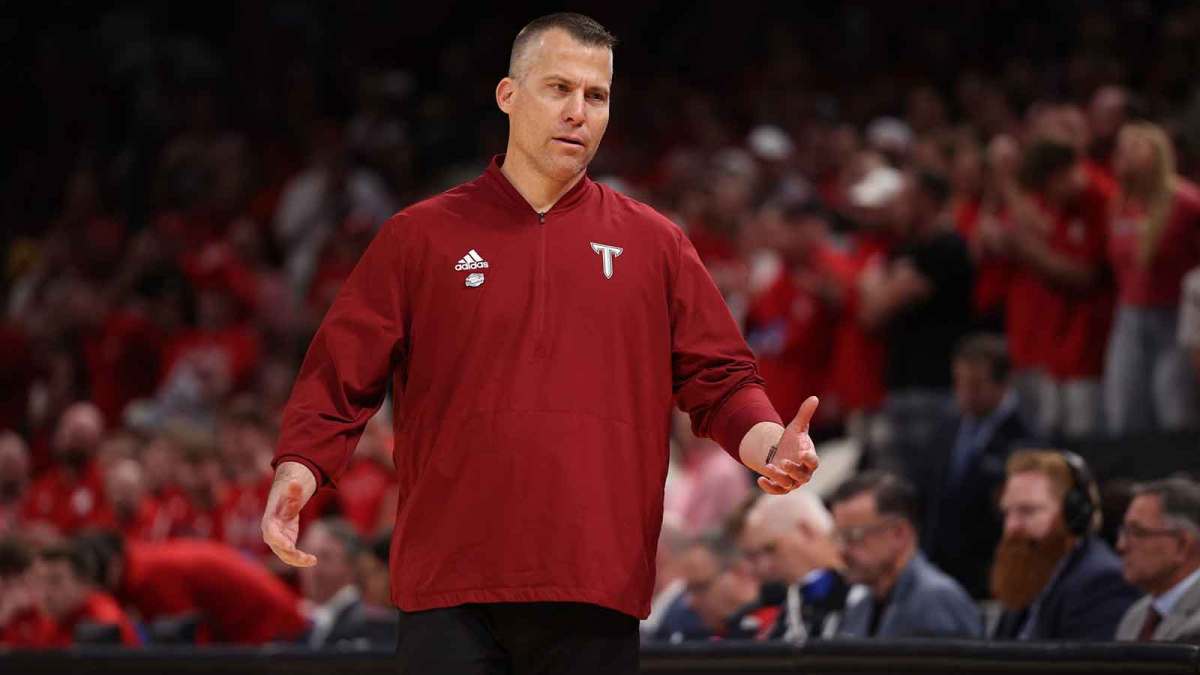 Troy Trojans head coach Scott Cross stands on the sidelines during the first half against the Nebraska Cornhuskers during a first round game of the men's 2026 NCAA Tournament at Paycom Center.