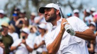 Scottie Scheffler tees off on the 16th hole during the third round of The Players Championship golf tournament at TPC Sawgrass, in Ponte Vedra Beach, Fla. Saturday March 14, 2026.