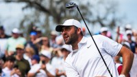 Scottie Scheffler reacts to his tee shot off the 16th hole during the third round of The Players Championship golf tournament at TPC Sawgrass, in Ponte Vedra Beach, Fla. Saturday March 14, 2026.