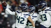 Seattle Seahawks linebacker Drake Thomas (42) reacts after an interception against the San Francisco 49ers during the second half at Levi's Stadium.