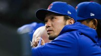 Chicago Cubs right fielder Seiya Suzuki (27) in the dugout during the eighth inning against the Washington Nationals at Wrigley Field.