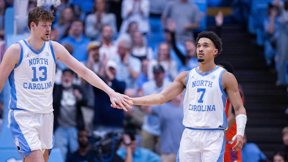 North Carolina Tar Heels center Henri Veesaar (13) celebrates with guard Seth Trimble (7) during the second half against the Clemson Tigers at Dean E. Smith Center.