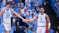 North Carolina Tar Heels center Henri Veesaar (13) celebrates with guard Seth Trimble (7) during the second half against the Clemson Tigers at Dean E. Smith Center.
