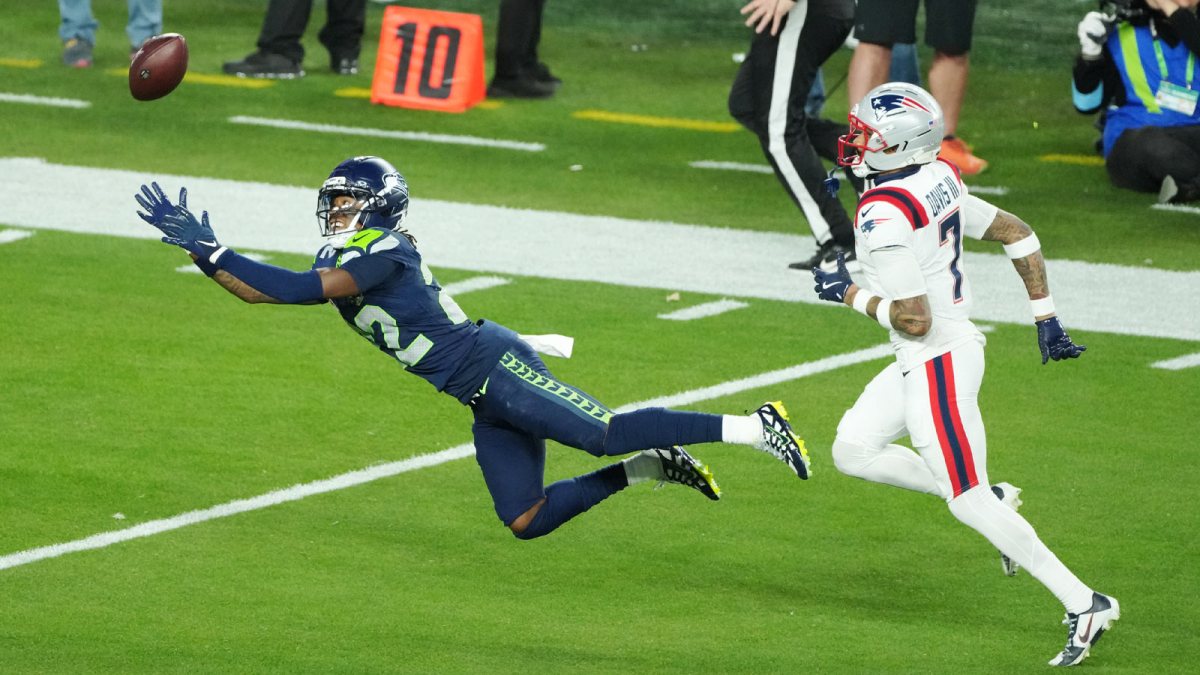 Seattle Seahawks wide receiver Rashid Shaheed (22) cannot catch a pass while defended by New England Patriots cornerback Carlton Davis III (7) in the second half in Super Bowl LX at Levi's Stadium.