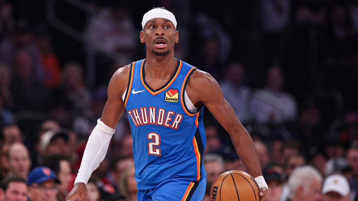 Oklahoma City Thunder guard Shai Gilgeous-Alexander (2) dribbles up court against the New York Knicks during the first half at Madison Square Garden.