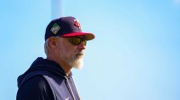 Manager Derek Shelton walks near the dugout during the Minnesota Twins first full-squad workout of spring training at Lee Health Sports Complex in Fort Myers, Fla., on Monday, Feb. 16, 2026.