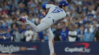 Los Angeles Dodgers starting pitcher Shohei Ohtani (17) throws pitch against the Toronto Blue Jays in the first inning for game seven of the 2025 MLB World Series at Rogers Centre.
