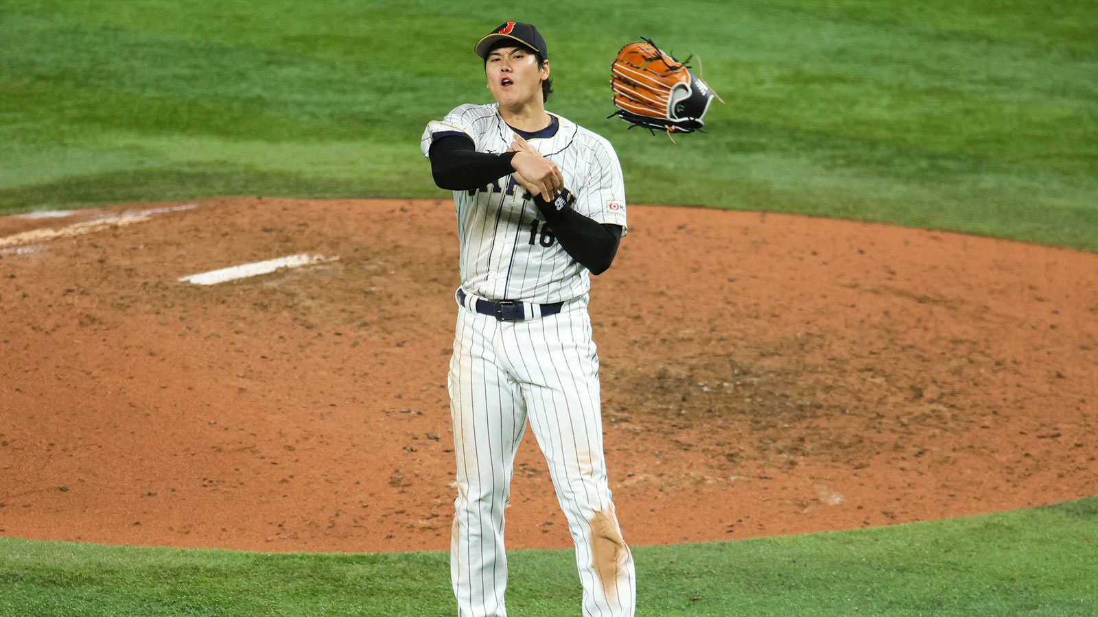Japan relief pitcher Shohei Ohtani (16) celebrates after defeating Team USA to win the World Baseball Classic at LoanDepot Park.
