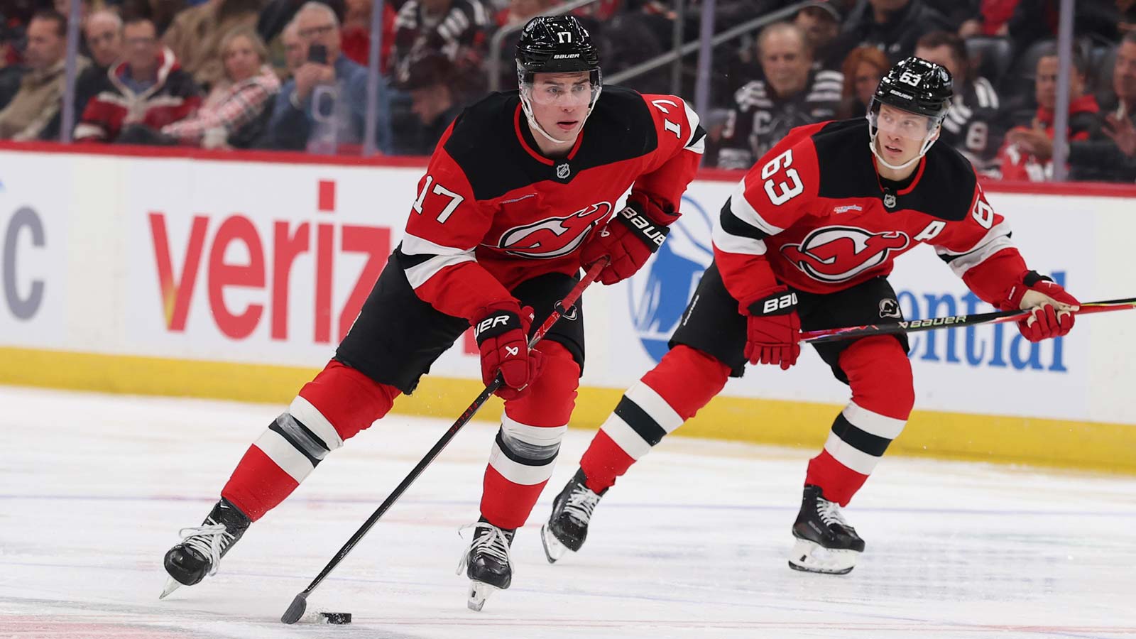 New Jersey Devils defenseman Simon Nemec (17) skates with the puck against the Columbus Blue Jackets during the second period at Prudential Center. 