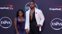 Simone Biles (left) and Jonathan Owens pose on the ESPYs red carpet at the Dolby Theatre.