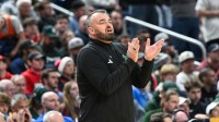 South Florida Bulls head coach Bryan Hodgson looks on during the second half against the Louisville Cardinals during a first round game of the men's 2026 NCAA Tournament at Keybank Center.
