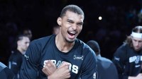 Spurs forward Victor Wembanyama (1) is introduced before the game against then Chicago Bulls at Frost Bank Center with Thunder's Shai Gilgeous-Alexander in the background