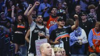 San Antonio Spurs fans cheer for their team against the Oklahoma City Thunder during the second half at Paycom Center.