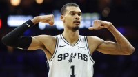 Spurs forward Victor Wembanyama (1) reacts after his team