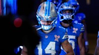 Detroit Lions wide receiver Amon-Ra St. Brown (14) walks down the tunnel for warm up at Ford Field in Detroit on Sunday, Dec. 21, 2025.