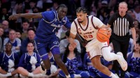 St. John's Red Storm forward Bryce Hopkins (23) controls the ball against Seton Hall Pirates guard Jacob Dar (1) during the second half at Madison Square Garden. Mandatory Credit: Brad Penner-Imagn Images