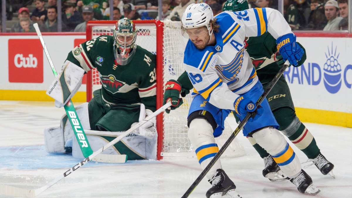 St. Louis Blues center Robert Thomas (18) attempts a wrap around on Minnesota Wild goaltender Filip Gustavsson (32) in the third period at Grand Casino Arena