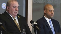 Pittsburgh Steelers head coach Mike McCarthy (left) speaks at a press conference introducing him as the next head coach of the Steelers as general manager Omar Khan (right) listens in at PNC Champions Club at Acrisure Stadium..