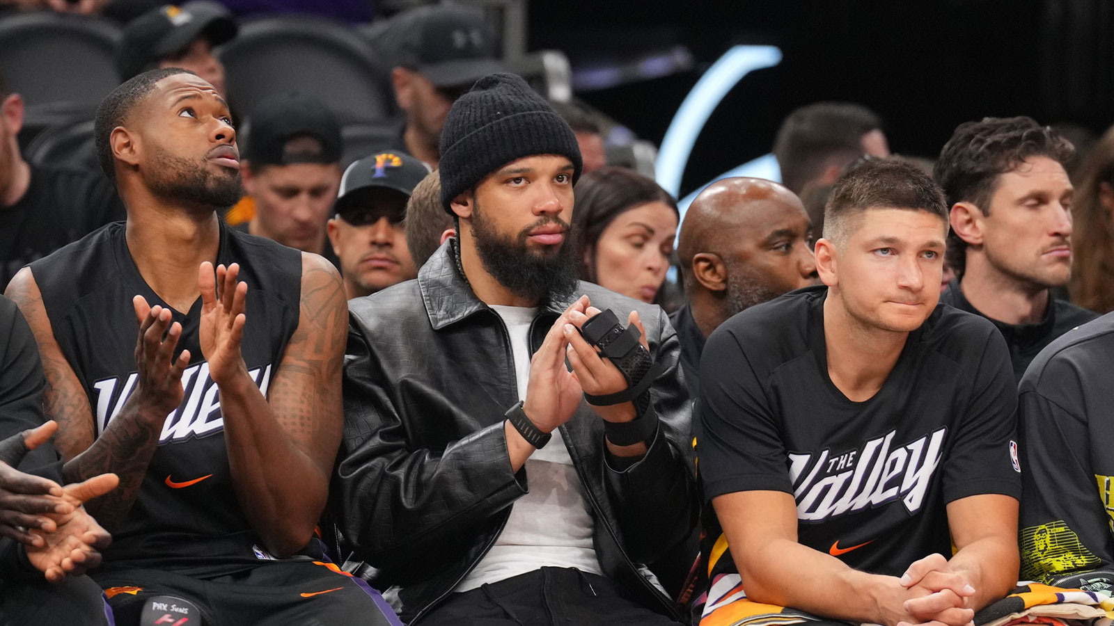 Suns player Dillon Brooks (center) looks on against the New Orleans Pelicans during the second half at Mortgage Matchup Center