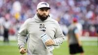 New England Patriots quarterback coach T.C. McCartney against the Arizona Cardinals at State Farm Stadium.