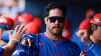New York Mets left fielder Mike Tauchman (50) celebrates after scoring against the Washington Nationals during the first inning at CACTI Park of the Palm Beaches