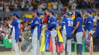Team Venezuela celebrates after defeating Italy in a semifinal game of the 2026 World Baseball Classic