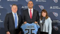 Tennessee Titans owner Amy Adams Strunk, general manager Mike Borgonzi and head coach Robert Saleh holds up the Titans jersey during the press conference at Ascension Saint Thomas Sports Park.