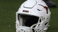 A Texas Longhorns helmet sits on the field prior to the game against the Mississippi State Bulldogs at Davis Wade Stadium at Scott Field.