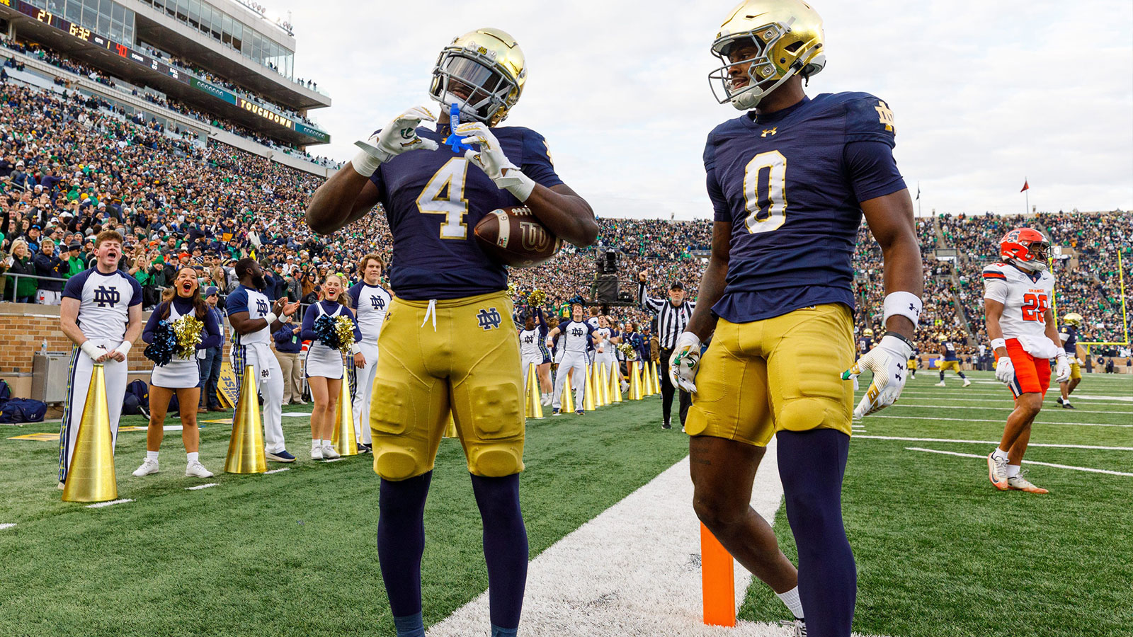 Notre Dame running back Jeremiyah Love (4) makes a heart sign after scoring a touchdown in the first half of a NCAA football game against Syracuse at Notre Dame Stadium on Saturday, Nov. 22, 2025, in South Bend.
