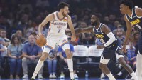 Thunder center/forward Chet Holmgren (7) moves the ball as Denver Nuggets guard/forward Tim Hardaway Jr. (10) defends during the first quarter at Paycom Center