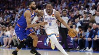 Thunder guard Jalen Williams (8) drives past New York Knicks guard Mikal Bridges (25) during the second half at Paycom Center with Thunder's Shai Gilgeous-Alexander in the background