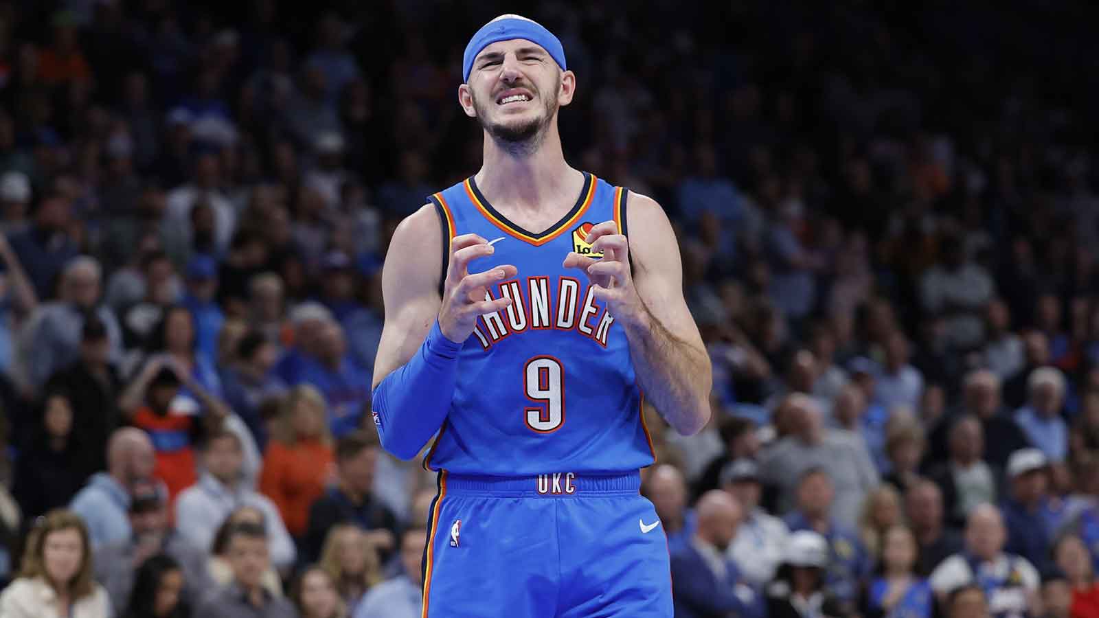 Thunder’s Alex Caruso desperately tries to block a shot with a shoe