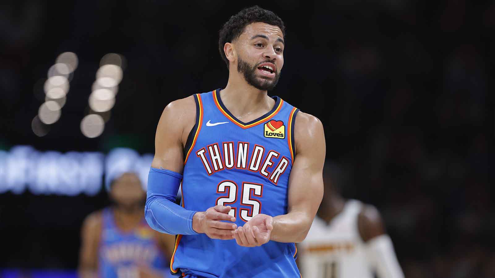 Oklahoma City Thunder guard Ajay Mitchell (25) talks to the bench after a play against the Denver Nuggets during the second quarter at Paycom Center.