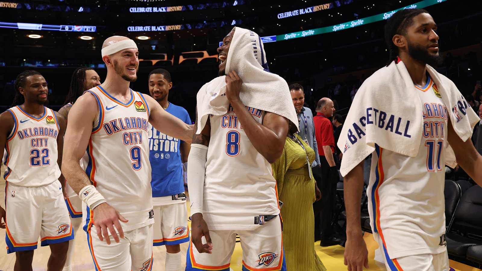 Thunder guard Jalen Williams (8) celebrates with guard Alex Caruso (9) after defeating the Los Angeles Lakers 119-110 at Crypto.com Arena