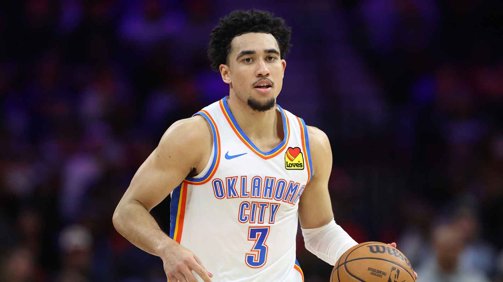 Thunder guard Jared McCain (3) dribbles the ball against the Philadelphia 76ers during the fourth quarter at Xfinity Mobile Arena