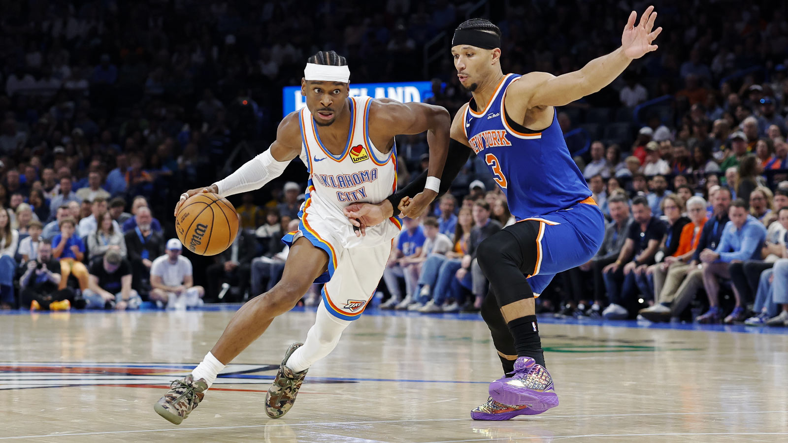 Thunder guard Shai Gilgeous-Alexander (2) drives around New York Knicks guard Josh Hart (3) during the second half at Paycom Center