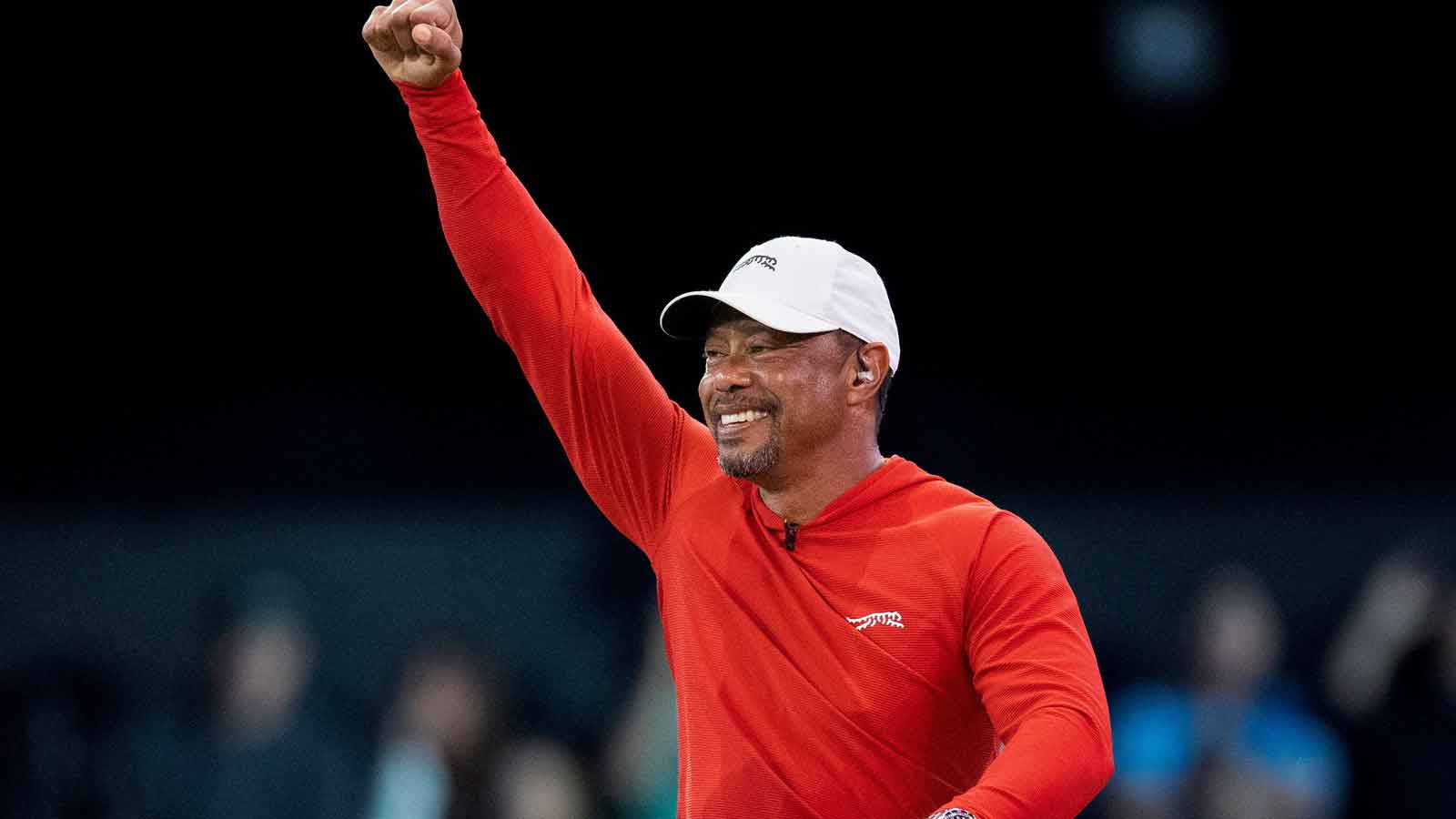 Tiger Woods looks genuinely impressed with Matthew Tkachuk’s gold medal