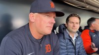 Detroit Tigers manager A.J. Hinch, left, and president of baseball operations Scott Harris, right, talk with reporters.