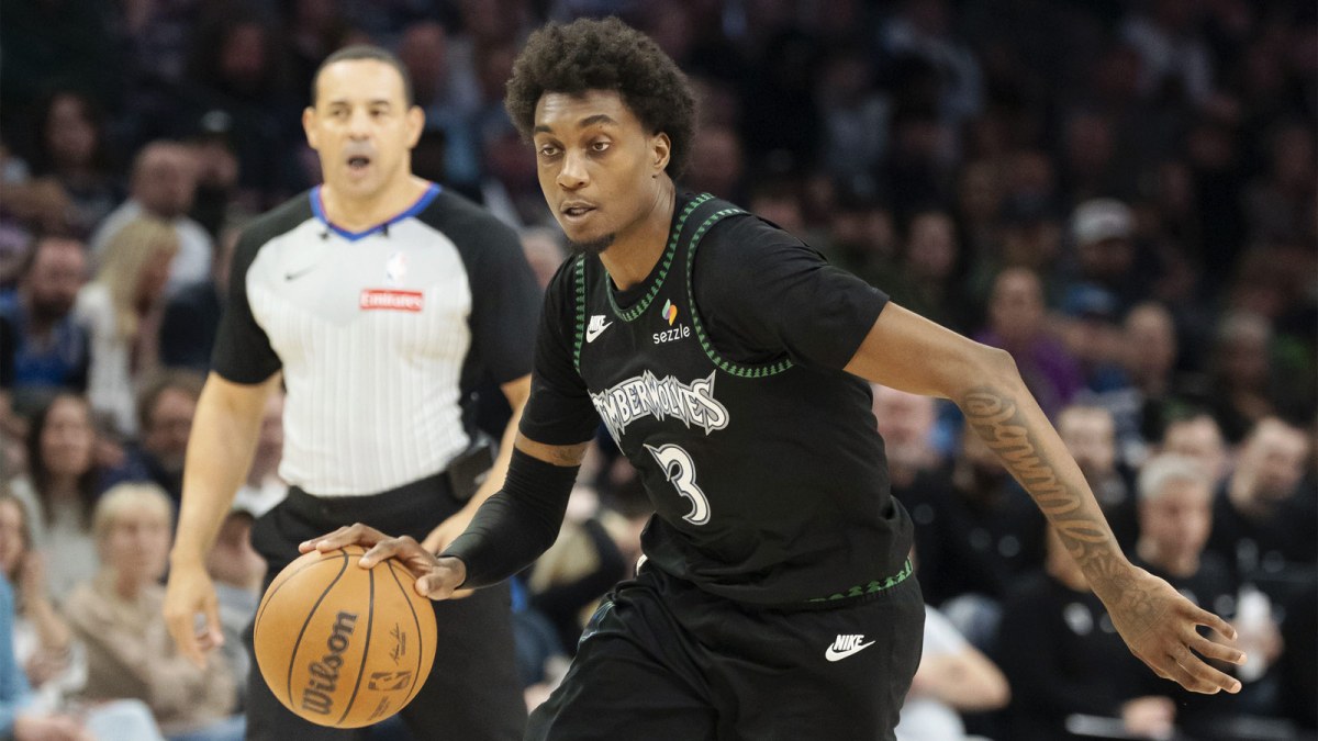 Minnesota Timberwolves forward Jaden McDaniels (3) dribbles the ball against the Portland Trail Blazers in the second half at Target Center.