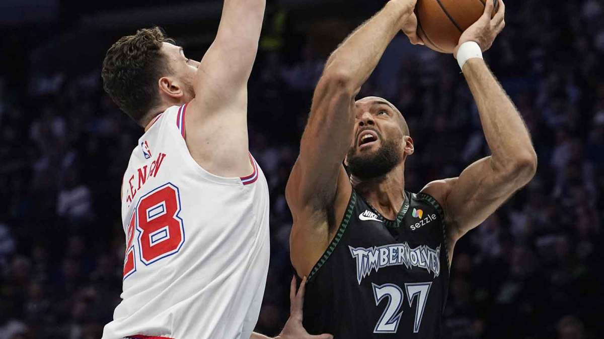 Minnesota Timberwolves center Rudy Gobert (27) shoots against Houston Rockets center Alperen Sengun (28) in the first quarter at Target Center.