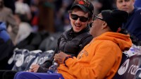 Oscar nominee Timothée Chalamet and Spike Lee at New York Knicks game.