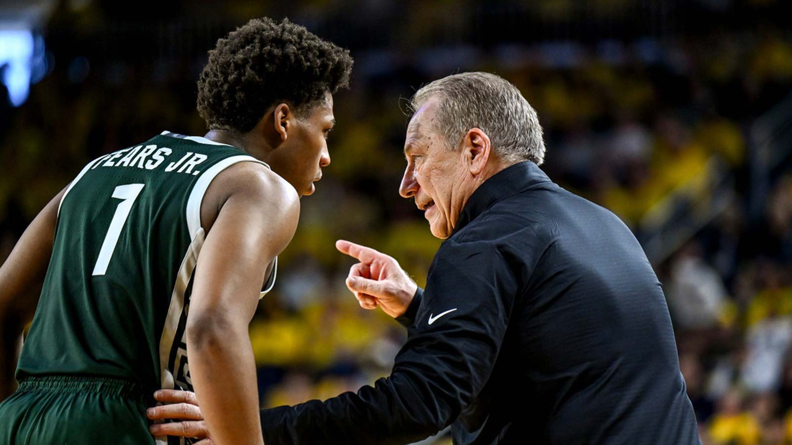 Michigan State's head coach Tom Izzo, right, talks with Jeremy Fears Jr. during the second half against Michigan on Sunday, March 8, 2026, at the Crisler Center in Ann Arbor.