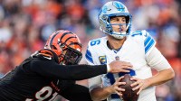 Detroit Lions quarterback Jared Goff (16) is sacked by Cincinnati Bengals defensive end Trey Hendrickson (91) during the second half at Paycor Stadium in Cincinnati on Sunday, Oct. 5, 2025.