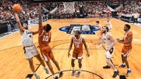 Purdue Boilermakers forward Trey Kaufman-Renn (4) shoots over Texas Longhorns forward Nic Codie (10) in the second half during a Sweet Sixteen game of the West Regional of the men's 2026 NCAA Tournament at SAP Center.