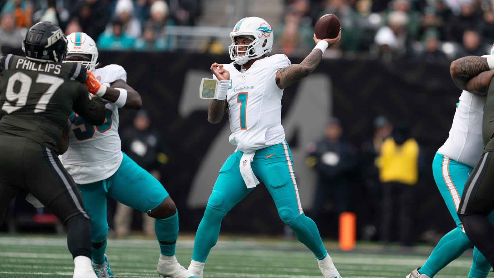 Miami Dolphin's quarterback Tua Tagovailoa (1) looks to pass the ball during a week 14 football game between the New York Jets and Miami Dolphins at MetLife Stadium on Sunday, Dec. 7, 2025.