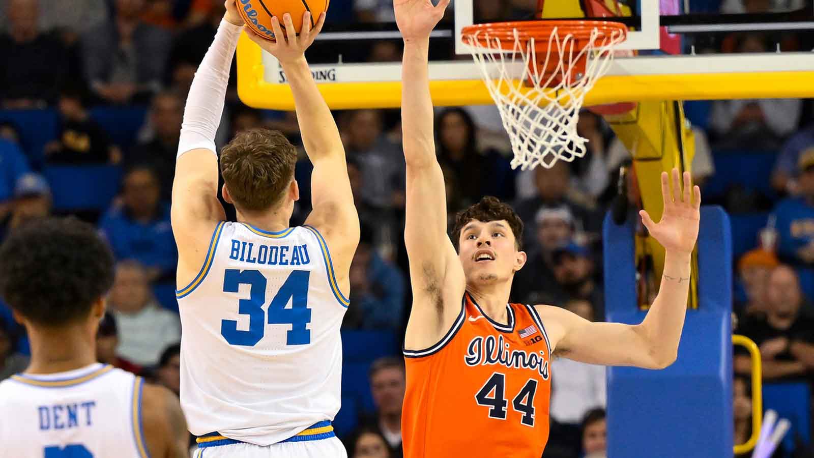 UCLA forward Tyler Bilodeau (34) shoots over Illinois center Zvonimir Ivisic (44) during the second half at Pauley Pavilion presented by Wescom Financial.