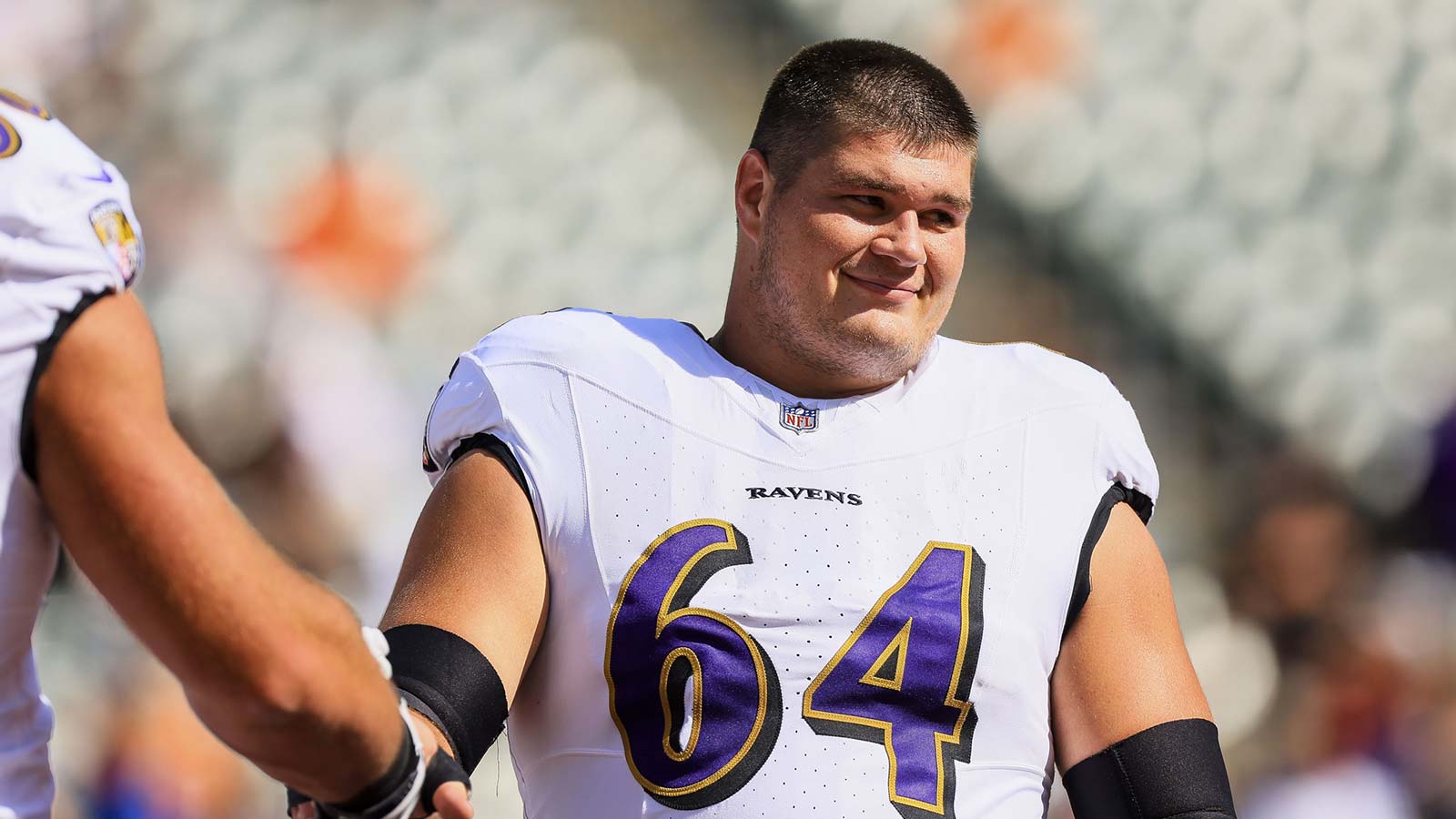 Baltimore Ravens center Tyler Linderbaum (64) during warmups before the game against the Cincinnati Bengals at Paycor Stadium.